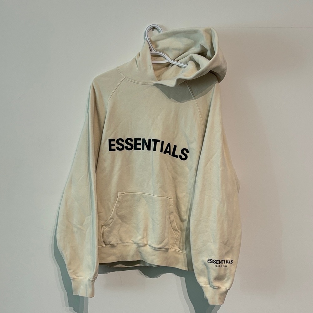 Essentials Cream Hoodie with Black Text - FEAR OF GOD